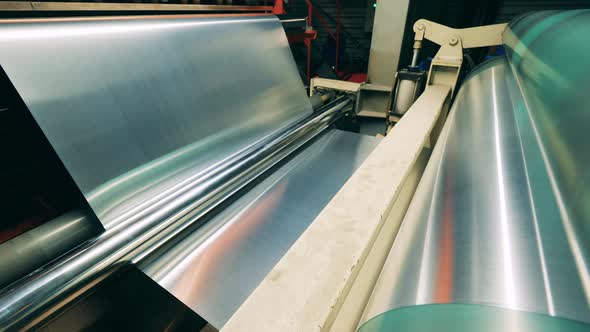 Metall Rolling Sheet Metal Comes Through Rollers at Rolling Mill