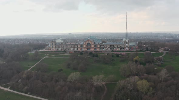 Cinematic circling drone shot around alexandra palace and grounds London