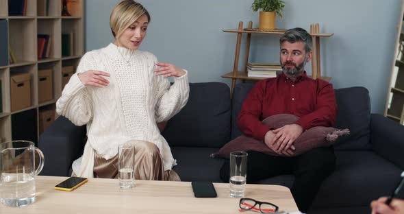 Crop View of Married Couple Discussing Family Problems with Psychologist
