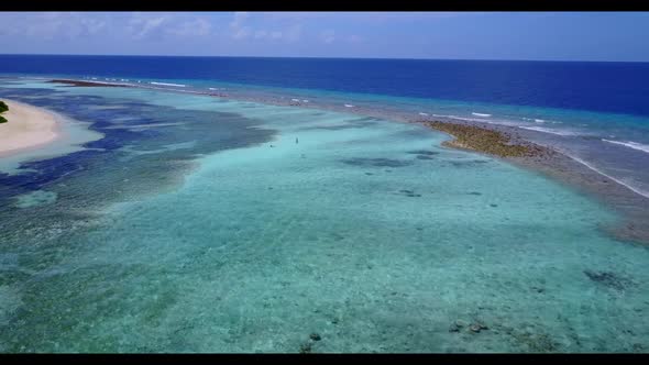 Aerial top down travel of relaxing island beach lifestyle by aqua blue water with white sand backgro