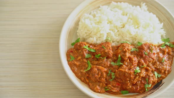 chicken tikka masala with rice on plate - Indian food style