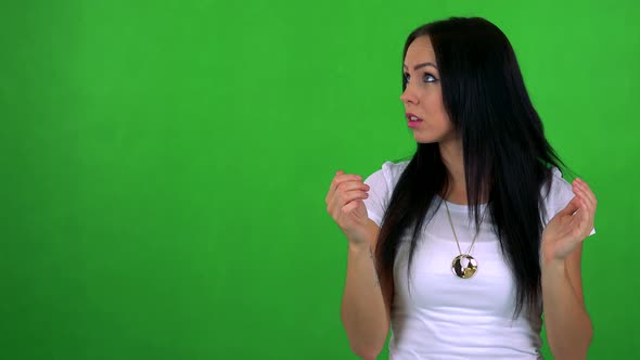 Young Pretty Woman Is Suprised - Green Screen - Studio