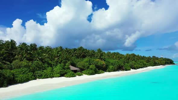 Aerial drone seascape of tropical lagoon beach holiday by blue lagoon with white sand background of 