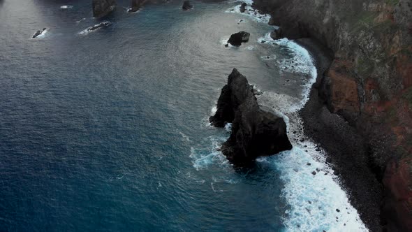 Orbit Shot of Sea Cliff at the Shore of Madeira Island, Portugal