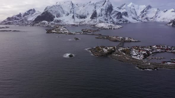 Hamnoy Village and Mountains in Winter. Lofoten Islands, Norway. Aerial View