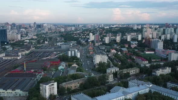 Aerial View of Skyline of Kyiv, Ukraine With Railroad Tracks and Busy Streets in View