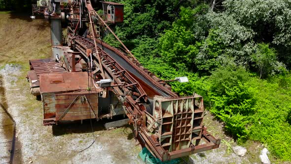 Abandoned bucket wheel excavator drone video