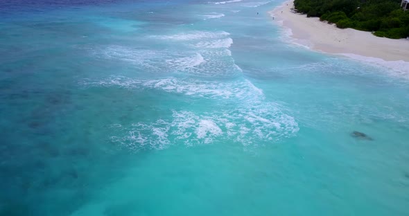 Beautiful drone clean view of a sunshine white sandy paradise beach and aqua blue ocean background i