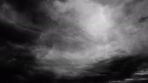 timelapse of cumulonimbus clouds n moving across the gray dark sky