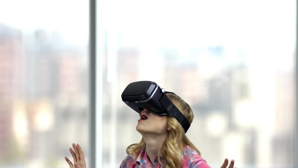 Young Woman Wear Virtual Reality Digital Glasses.