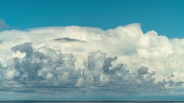 Layers of cloudsing in sky above South Pacific Ocean, Timelapse