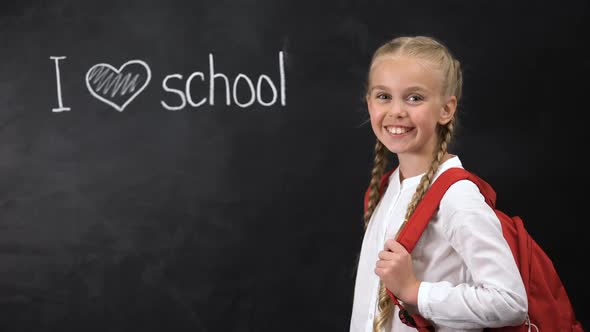 I Love School on Blackboard, Laughing Girl Showing Thumbs Up Gesture, Education