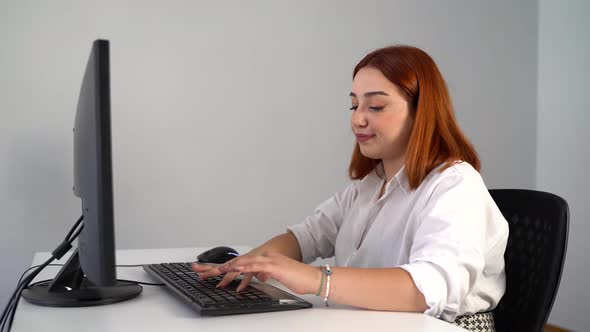 Unhappy Woman Bored Working on Computer in Office 4K