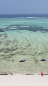 Vertical Video Boats in the Ocean Near the Coast of Zanzibar Tanzania