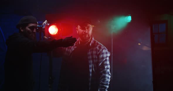 Film Crew Using a Fresnel Lamp