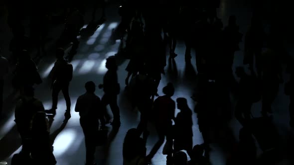 Group of Pedestrians Commuting on Crowded Urban City Street