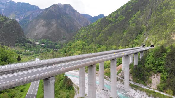 Aerial View of the Concrete Highway Viaduct on Concrete Pillars in the Mountains