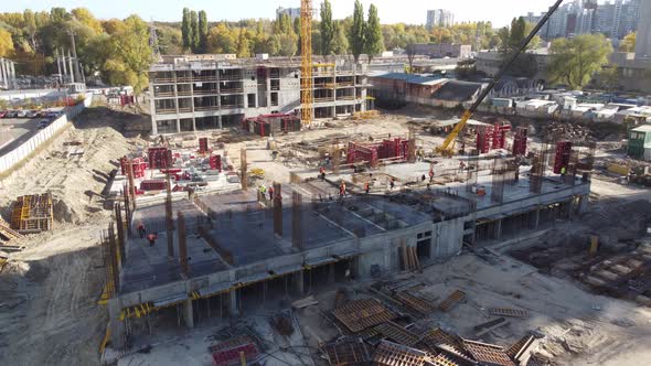 Construction Site Buildings with Cranes