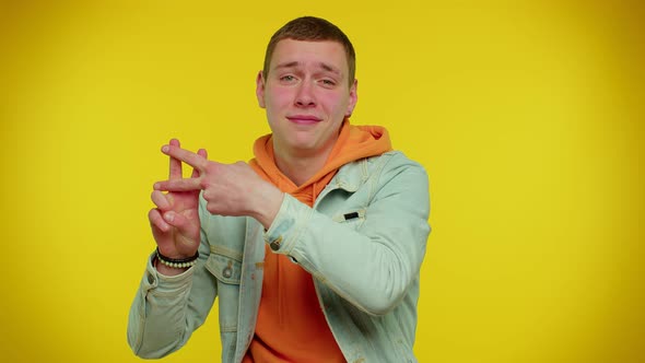 Cheerful Teen Man Showing Hashtag Symbol with Hands Likes Tagged Message Popular Viral Content