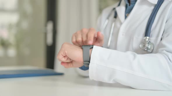 Close Up of Doctor Using Smartwatch