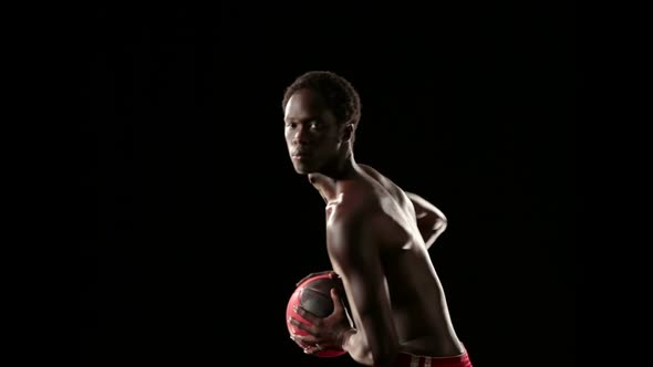 Man Play Basketball Isolated on Black