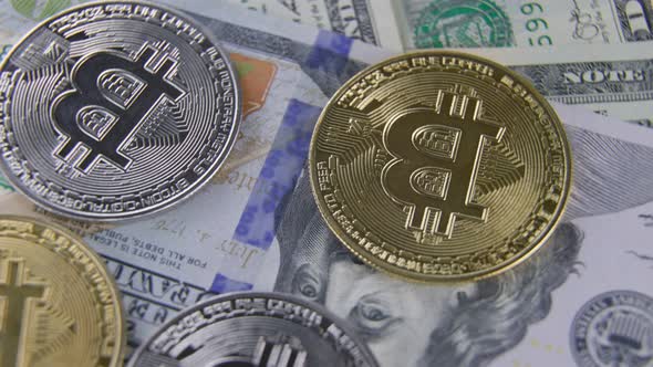 Bitcoin Coins Lie on Dollars