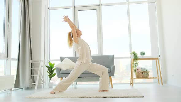 Woman Making Yoga at Home
