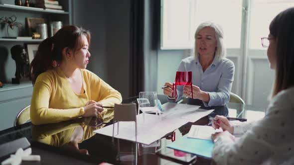 Three businesswomen having a meeting in the office
