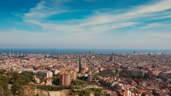 Timelapse scenery with the town near the sea and cloudy sky