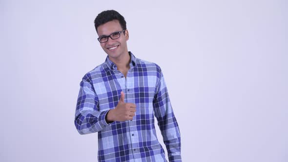 Happy Young Indian Hipster Man Giving Thumbs Up