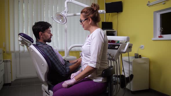 Satisfied Patient Giving Thanks To Dentist