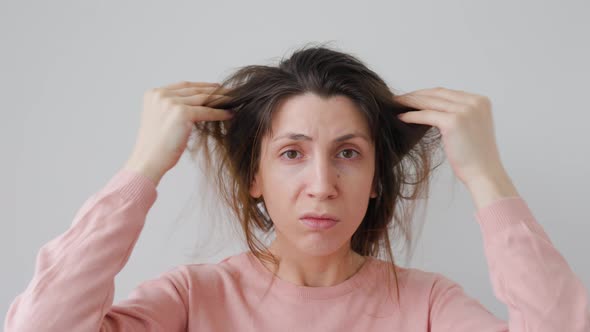 Woman with Hair Problems Depressed and Worried