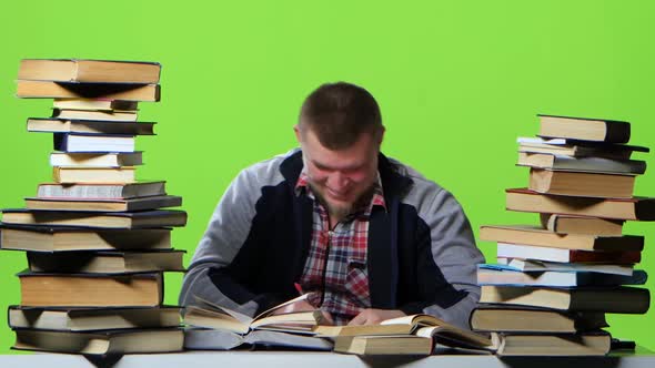 Guy That Reads and Writes Data To the Notebook Itself. Green Screen. Time Lapse