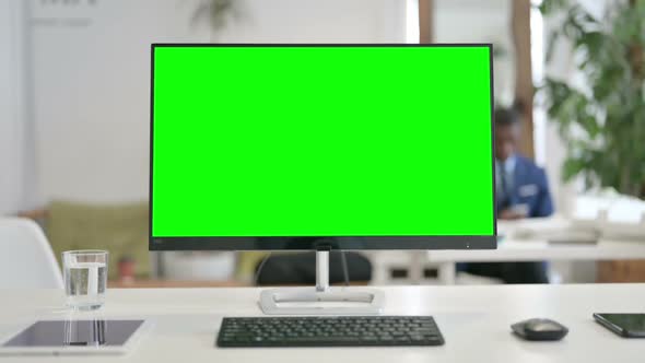 Close Up of Desktop with Green Chroma Key Screen