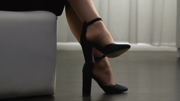 Elegant Female on High Heels Sitting With Legs Crossed, Trendy Shoes, Fashion