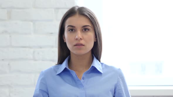 Hispanic Young Woman Gesturing Shock, Astonished