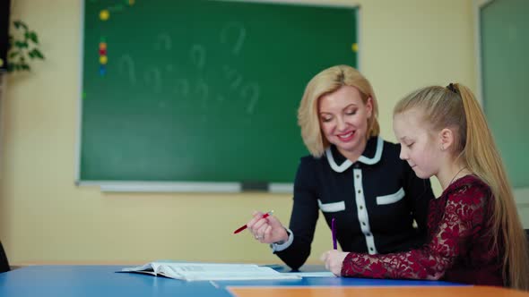 Teacher helps schoolgirl