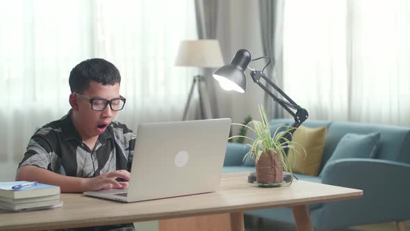 Bored Boy Yawning At Home While Doing Home Work, Child Learning Online