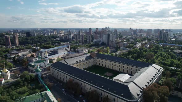 Aerial View of Metropolis City Skyline with Skyscrapers Green Trees and Sky