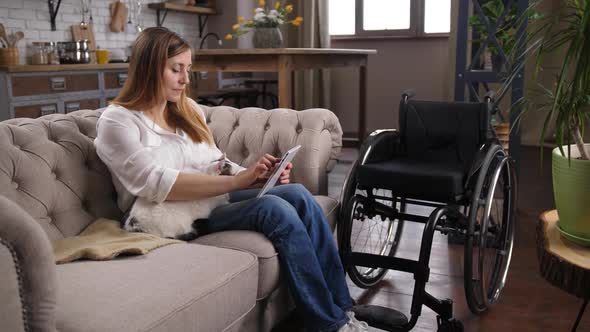 Disabled Woman with Tablet During Work From Home