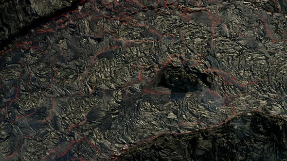 River Molten Lava Under extreme Heat. Texture of Boiling and glowing magma.Close up top down.