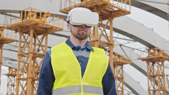 Construction Worker Using VR Goggles