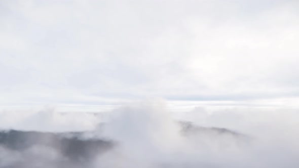 2k Flying Through White Clouds In Blue Sky And Ocean