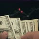 Trader Counting Dollars Banknotes Watching Stock Exchange Chart - VideoHive Item for Sale