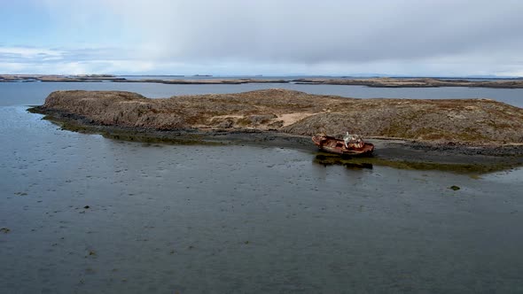 Small Uninhabited Island In Iceland with Rusty Abandoned Shipwreck