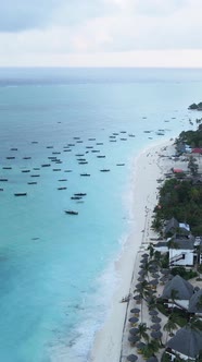 Vertical Video Boats in the Ocean Near the Coast of Zanzibar Tanzania