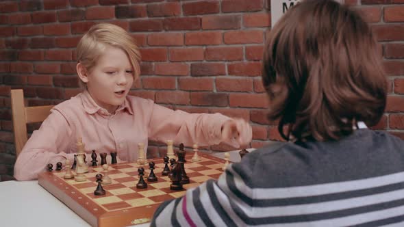 Two Boys Playing Chess