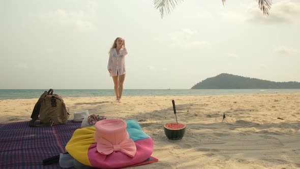 The Cheerful Woman in Holding and Eating Slices of Watermelon on Tropical Sand Beach Sea. Portrait