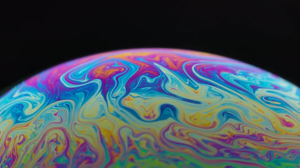 Half Circle a Soap Bubble Surface Multicolored in Motion Isolated on Black Background