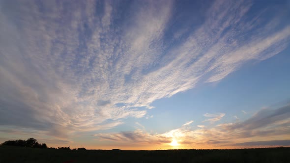 Burning Sunset On A Background Of Blue Sky